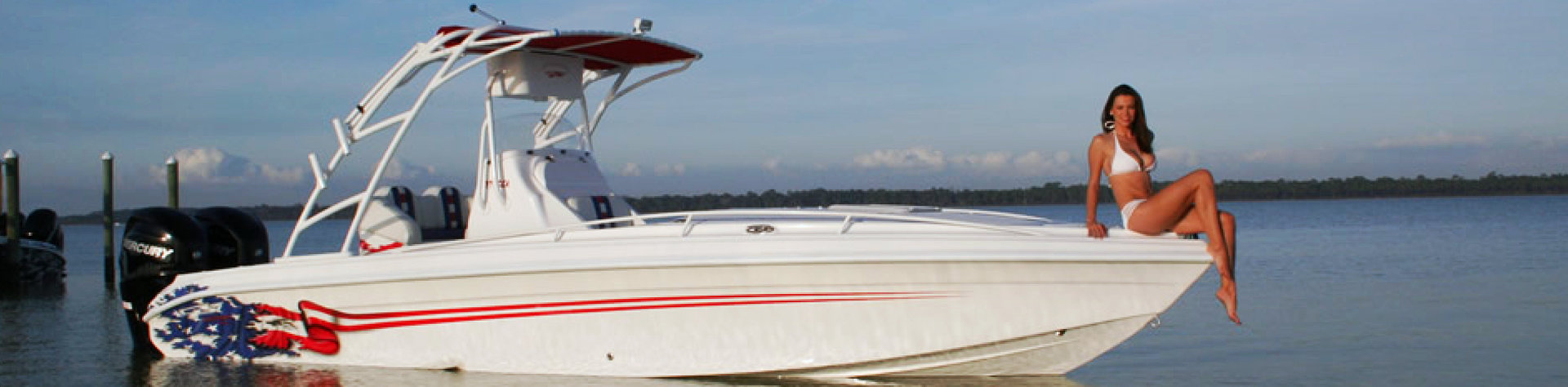 white boat with female model